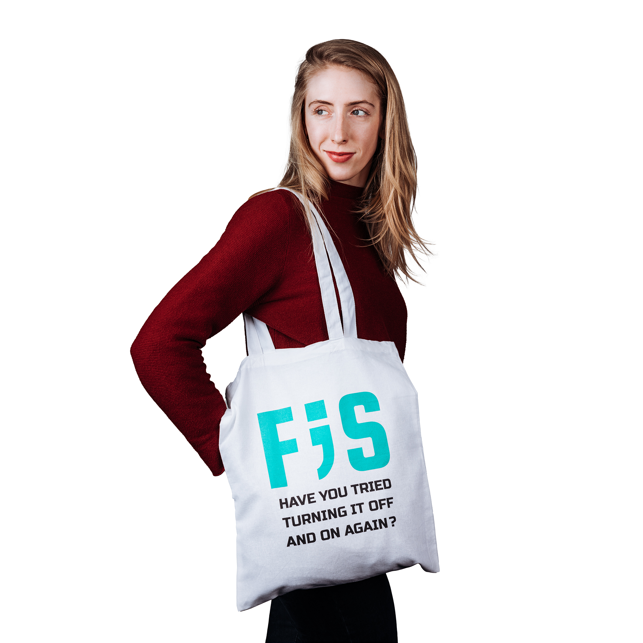 Bílá plátěná taška s velkým textem F;S s barvou ikonické FISácké zelené. Pod ním černý text o trochu menší velikosti "Have you tried turning it off and on again?".
